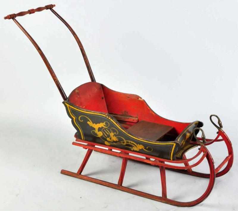 Appraisal: Wooden Child's Stenciled Sleigh With metal bird heads Condition Excellent