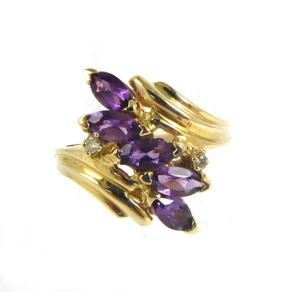 Appraisal: AMETHYST AND DIAMOND RING Marquise-cut purple amethysts ct total Round-cut