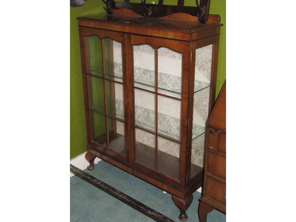 Appraisal: Mahogany display cabinet and a writing bureau