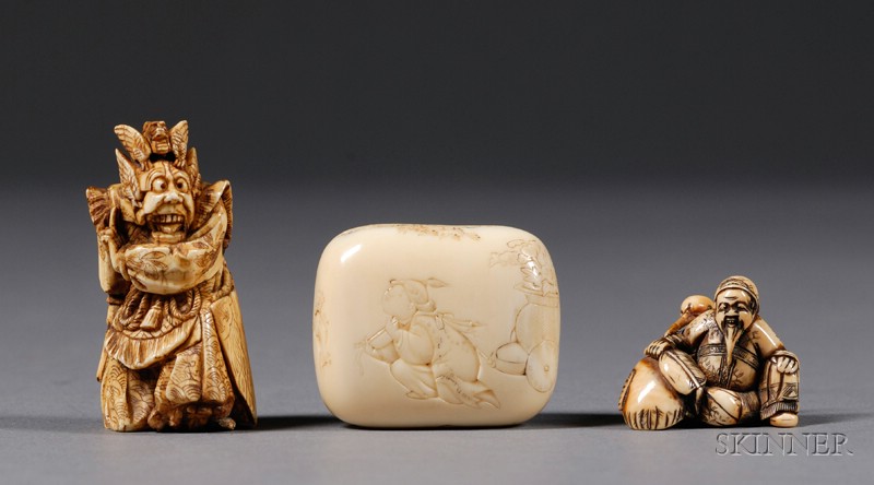 Appraisal: Three Ivory Netsuke th century an engraved manju a dragon