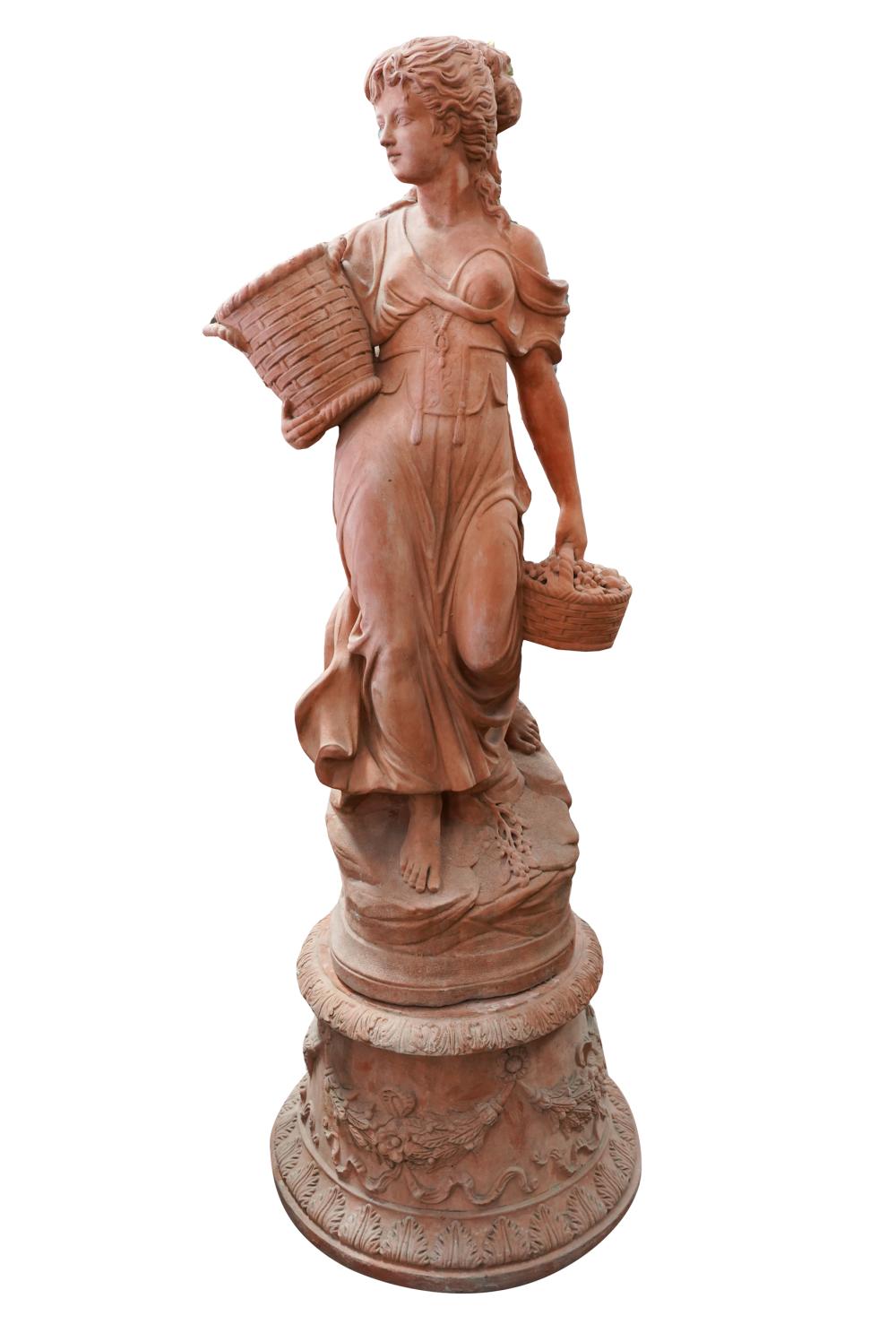 Appraisal: LARGE TERRACOTTA GARDEN SCULPTUREdepicting a maiden with baskets on a