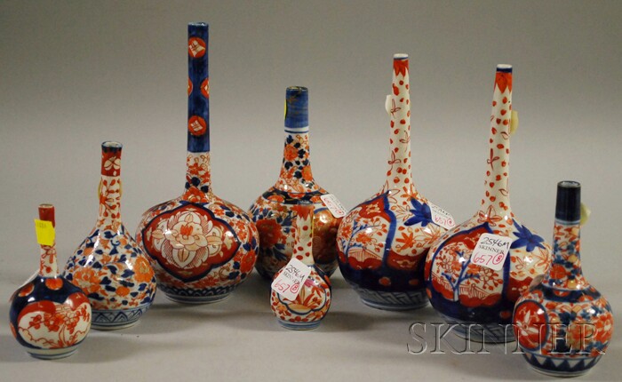 Appraisal: Eight Imari Porcelain Bottle Vases including a pair ht to