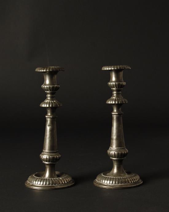 Appraisal: A Pair of th C Pewter Candlesticks each with gadrooning