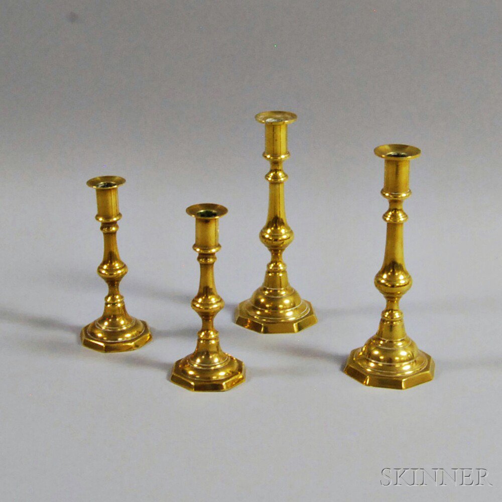 Appraisal: Two Pairs of Brass Candlesticks Europe th th century with