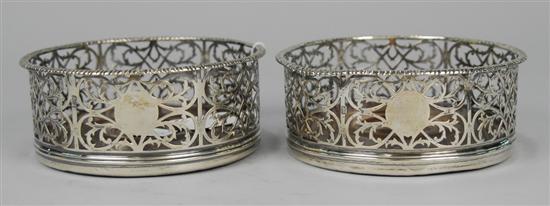 Appraisal: PAIR OF GEORGIAN SILVER WINE COASTERS Condition one bent and