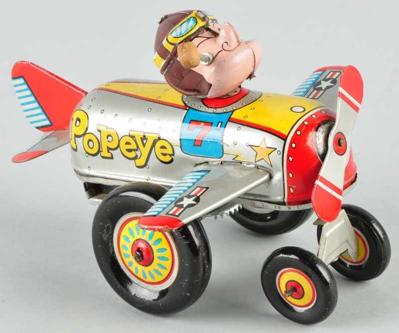 Appraisal: Tin Linemar Popeye in Airplane Toy Description Japanese Working One