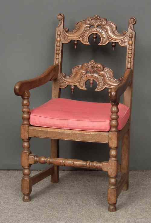 Appraisal: An oak open armchair of '' th Century'' design with