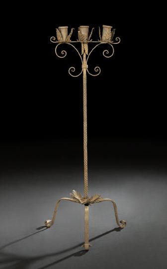 Appraisal: Spanish Provincial Wrought-Iron Floor Candelabra th century the three candle