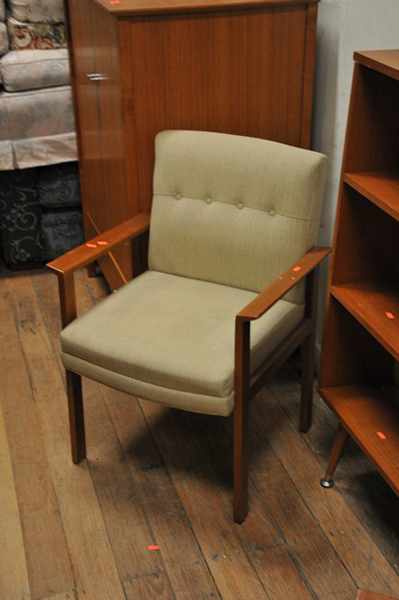 Appraisal: A PAIR OF MODERN TIMBER AND UPHOLSTERED ARM CHAIRS