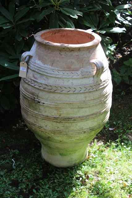 Appraisal: A LARGE OVOID TERRACOTTA PLANTER with sgraffito and ribbed decoration