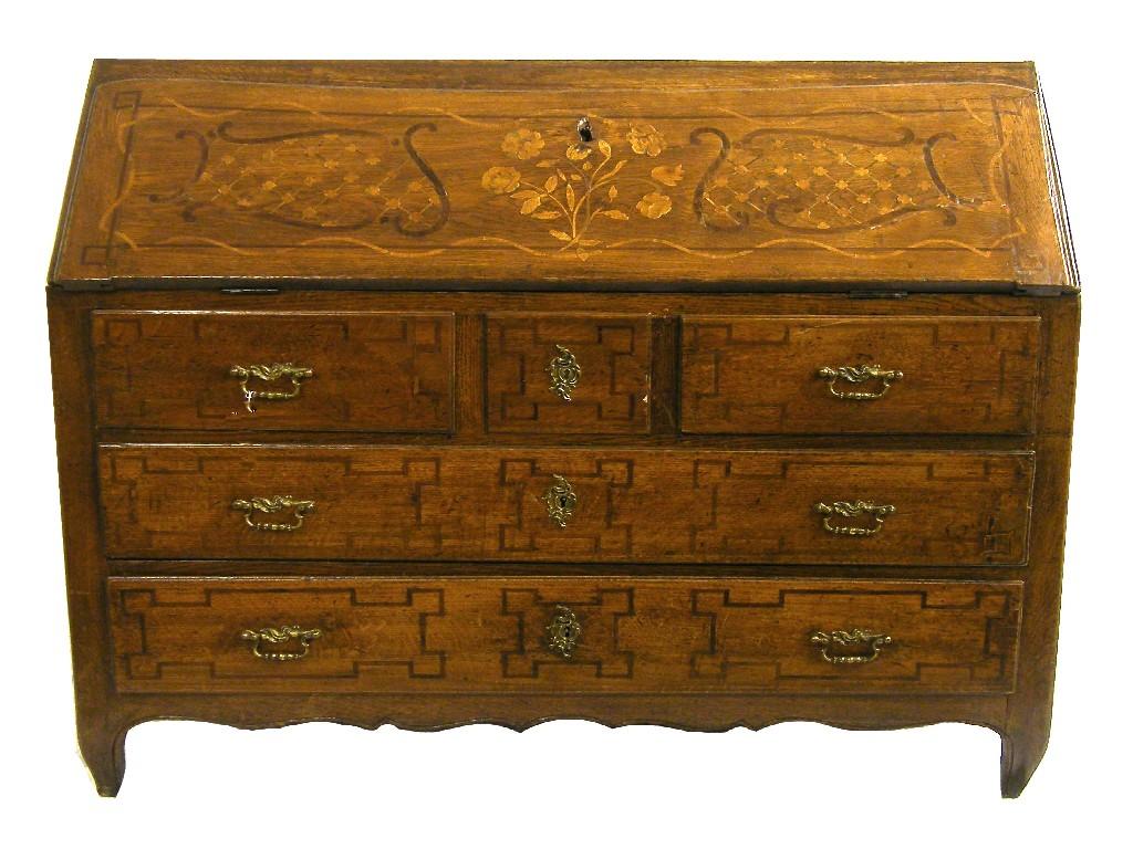 Appraisal: Late th early th century French provincial inlaid bureau the