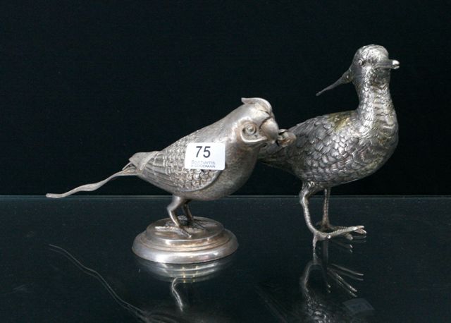 Appraisal: A pair of Italian silver parrots together with a silver