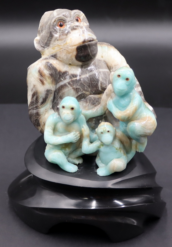 Appraisal: BEAUTIFULLY CARVED AMONIZITE MONKEY AND GORILLA Figural Grouping Set atop