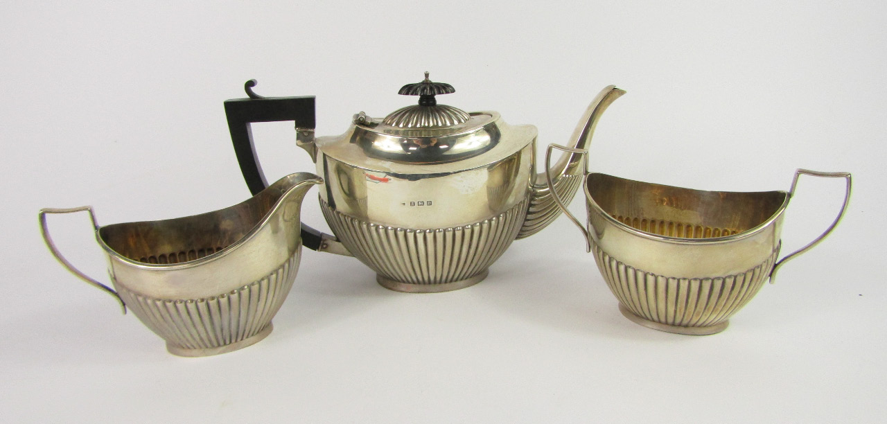 Appraisal: A George VI silver semi fluted three piece tea set