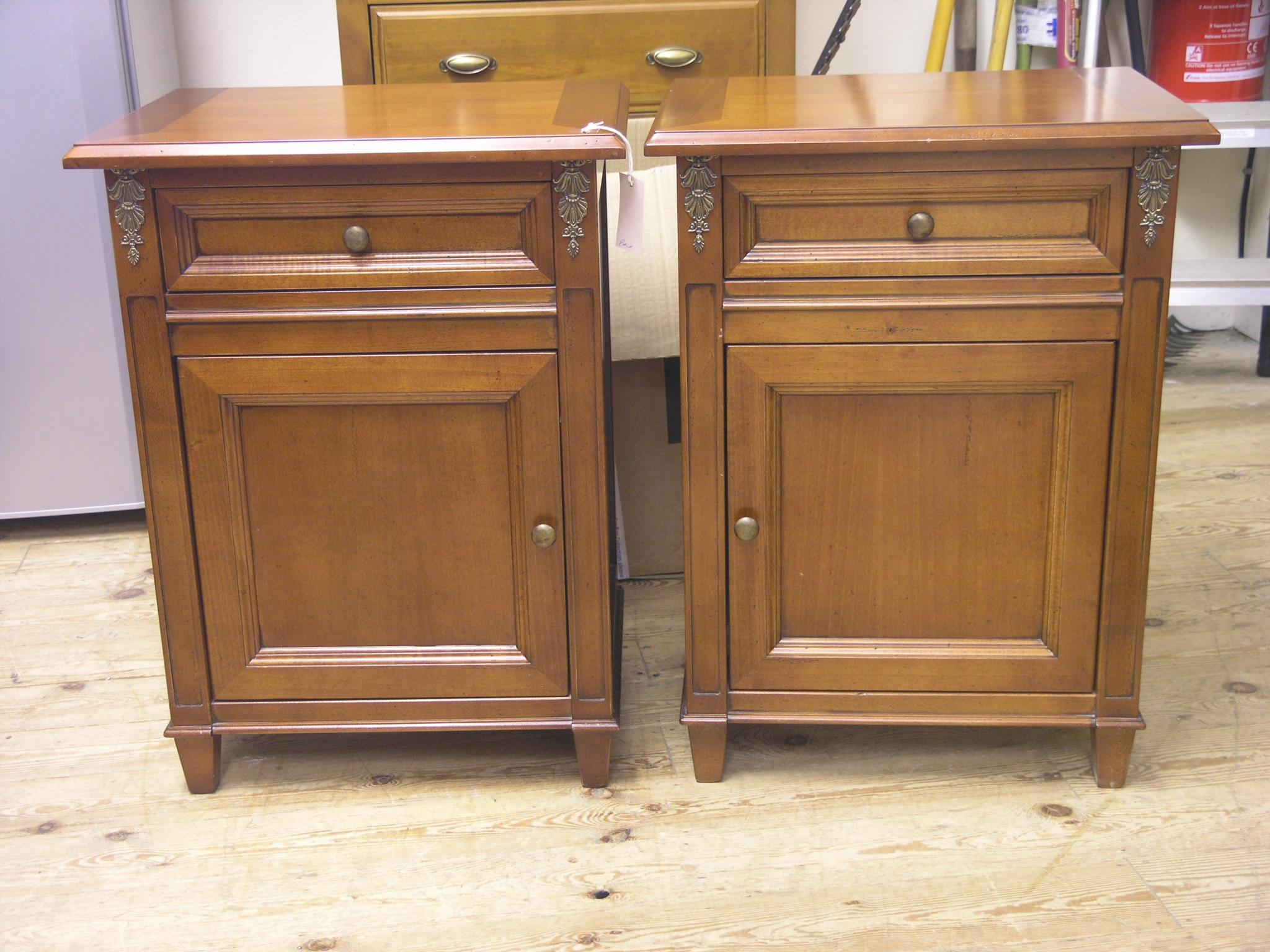 Appraisal: A pair of mahogany bedside cupboards each with ormolu mounts