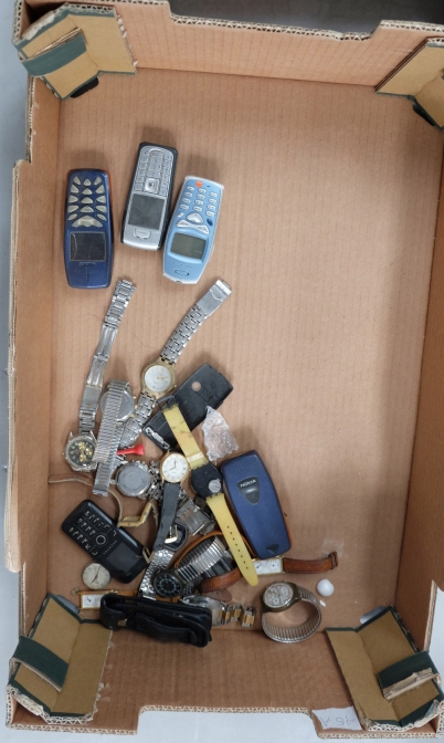 Appraisal: A collection of old mobile phone various gents wristwatches etc