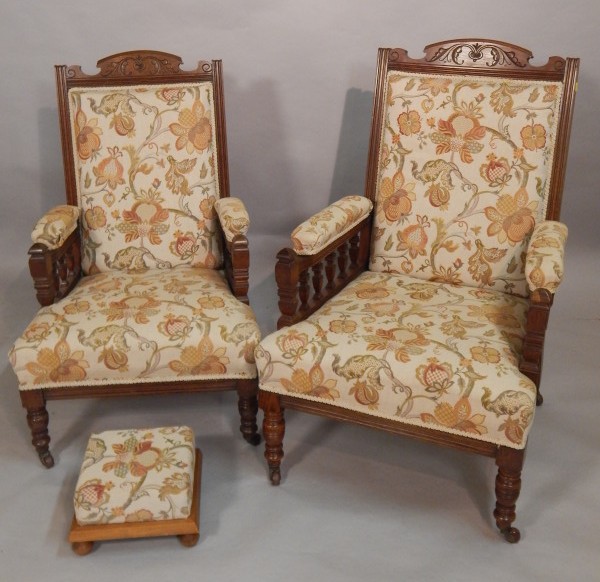 Appraisal: A pair of Victorian carved oak open armchairs each with