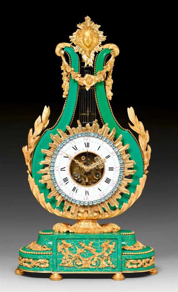 Appraisal: LYRE CLOCK WITH GREEN PORCELAIN late Louis XVI the porcelain