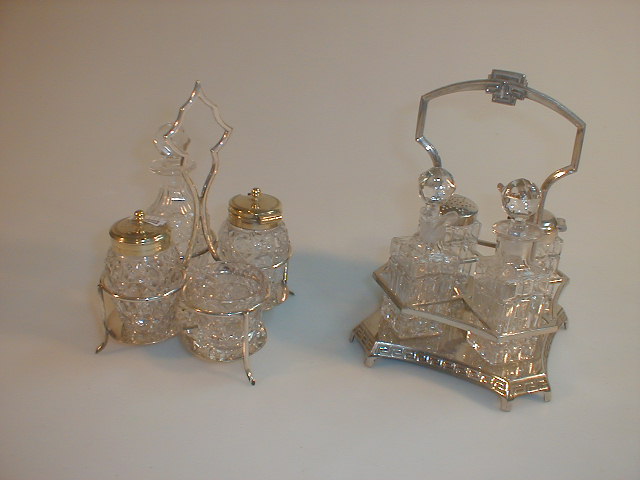 Appraisal: Two silver plated cruet stands with crystal bottles