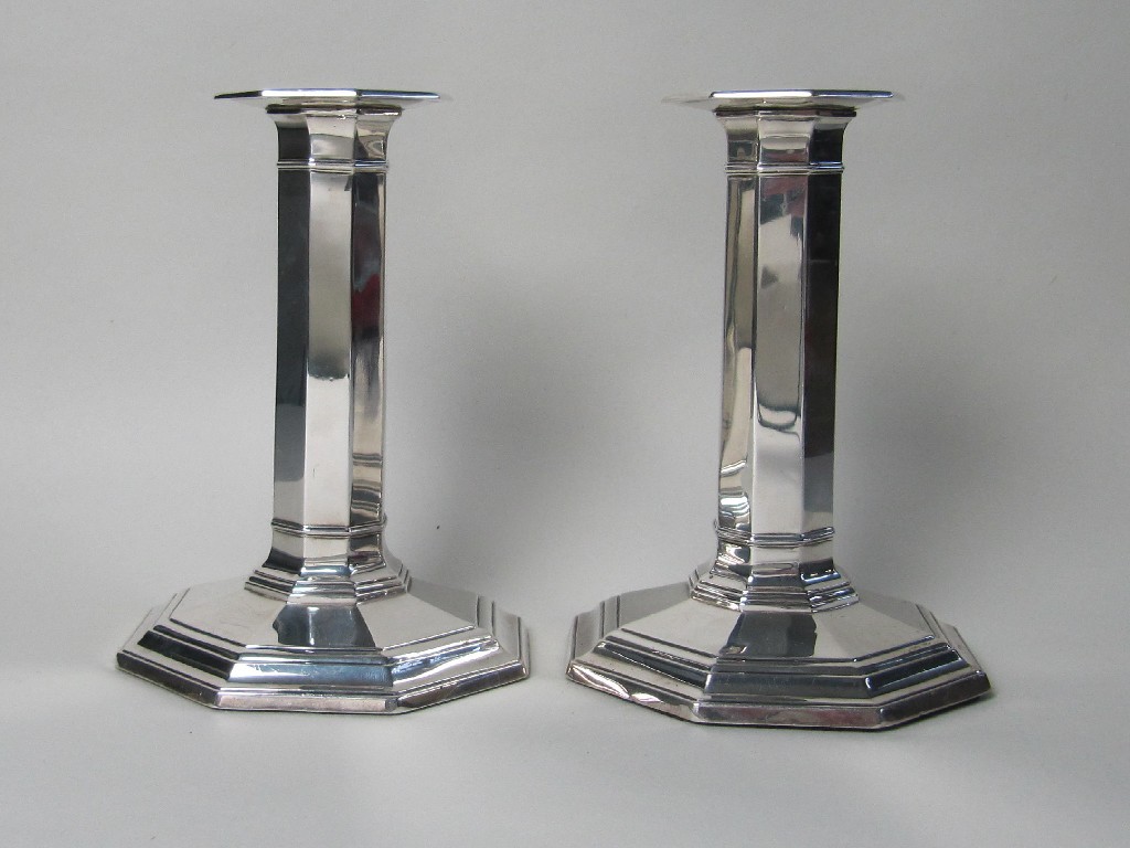 Appraisal: A pair of silver octagonal candl