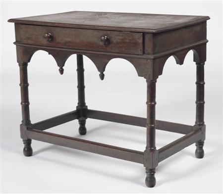 Appraisal: An th century oak side table the moulded rectangular top