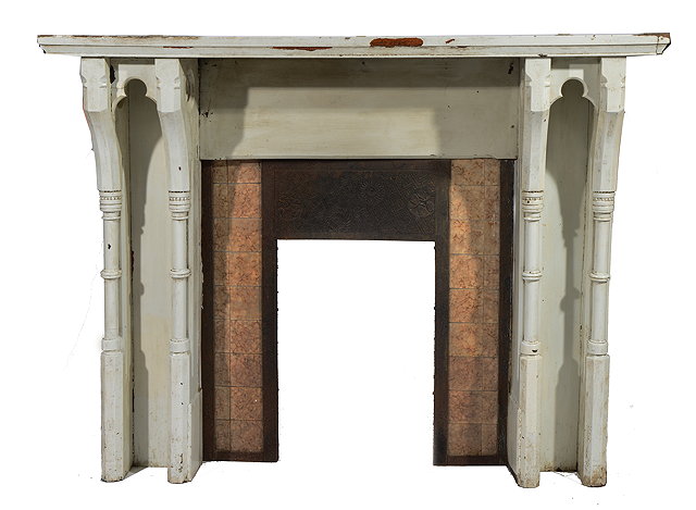 Appraisal: A VICTORIAN WHITE PAINTED GOTHIC REVIVAL MANTLEPIECE with turned pilaster