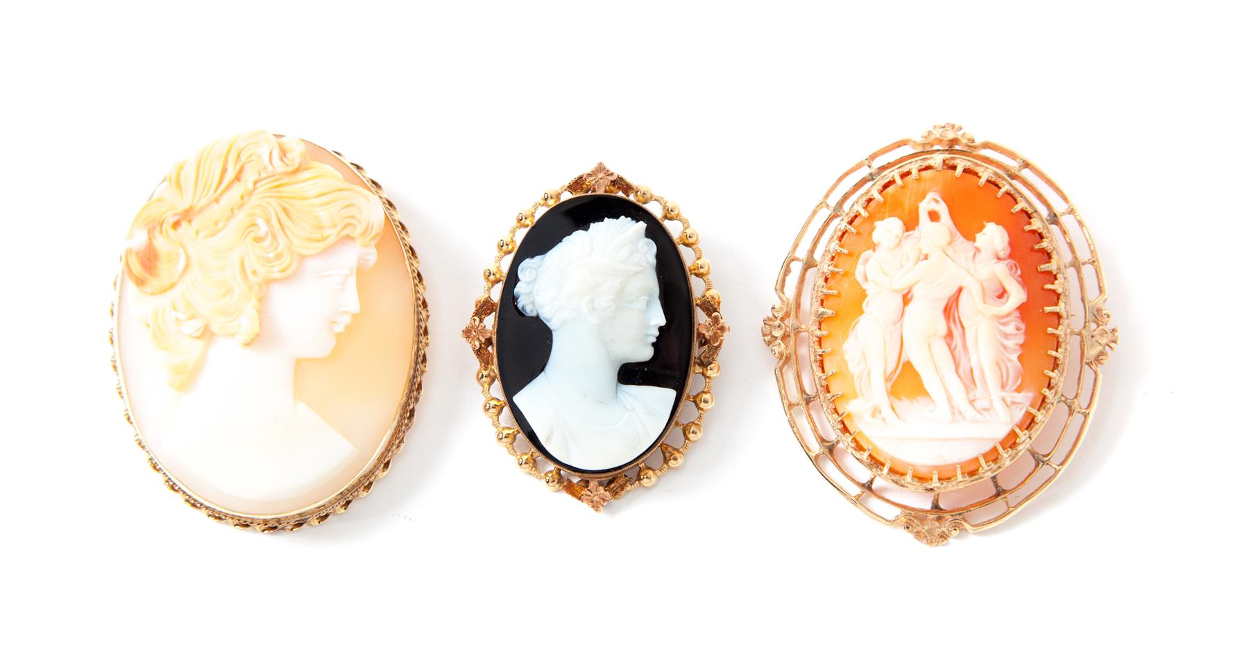 Appraisal: THREE CAMEO BROOCH PENDANTS American late th century Two carved