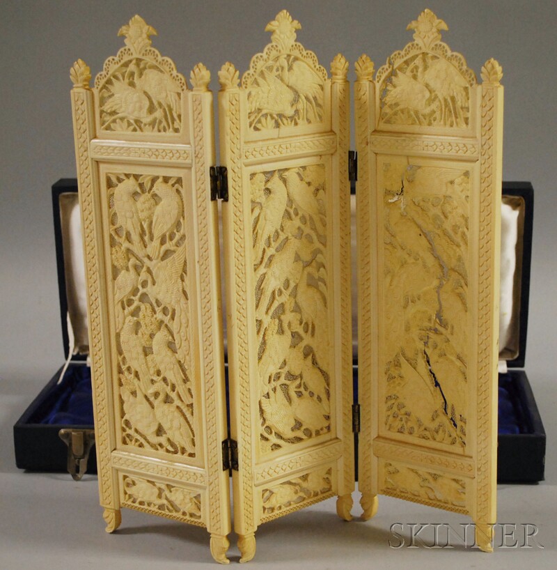 Appraisal: Carved Ivory Three-part Hinged Table Screen with Bird Decoration with