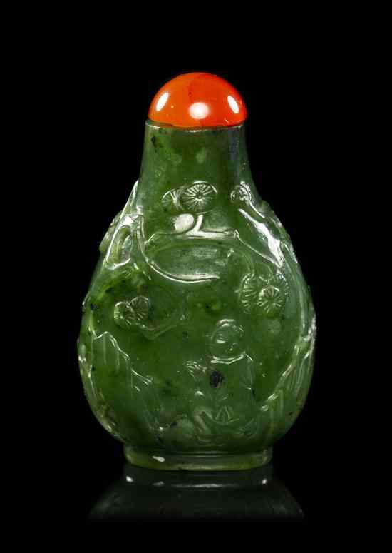 Appraisal: A Spinach Green Jade Snuff Bottle having raised decoration of