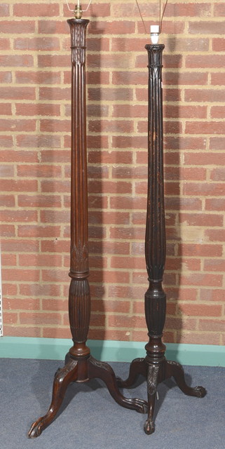 Appraisal: TWO OLD MAHOGANY 'BED POST' STANDARD LAMPS of fluted column