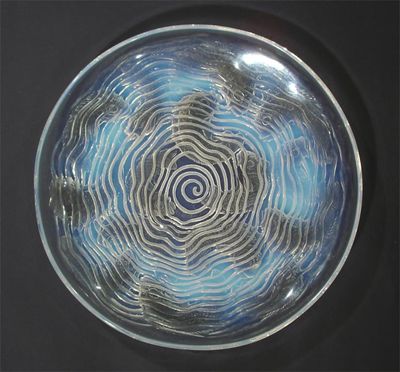 Appraisal: Dauphins No ' a Lalique opalescent glass bowl designed by