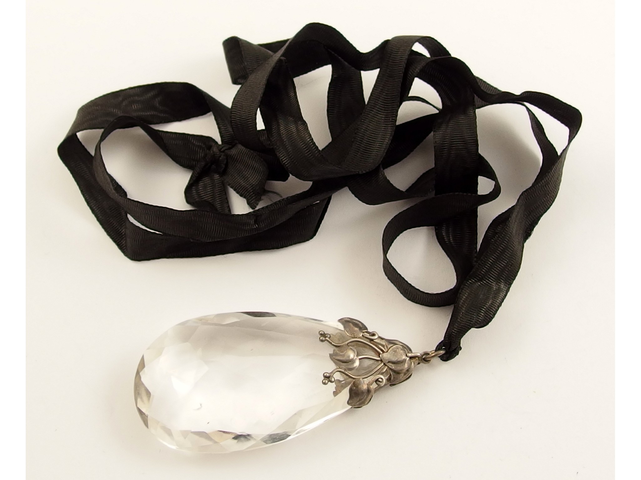 Appraisal: An Arts and Crafts rock crystal drop pendantthe pendant is