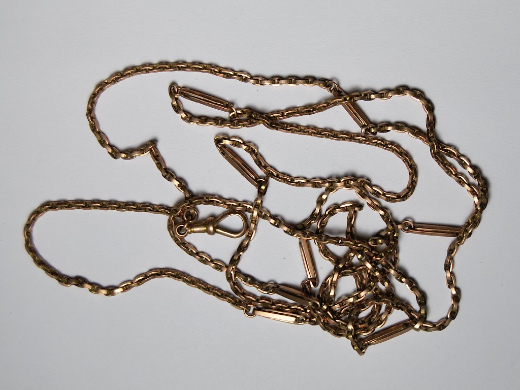 Appraisal: Secret link long guard chain stamped ct with swivel approx