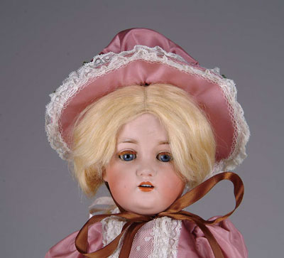 Appraisal: CATTERFELDER PUPPEN FABRIK DOLL Blue glass sleep eyed doll with