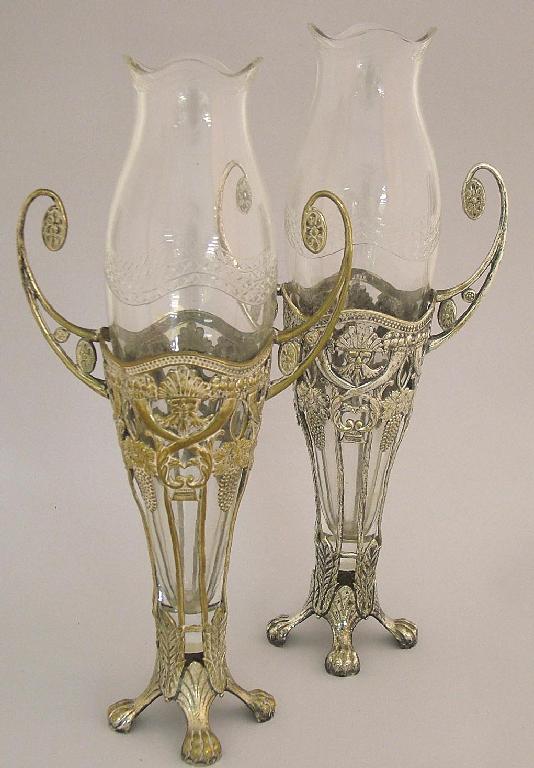 Appraisal: Pair of WMF silvered metal and clear cut glass twin