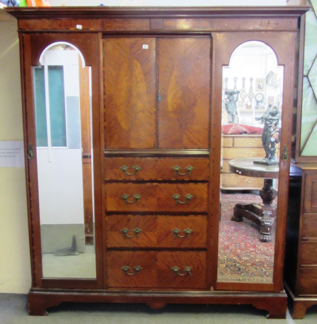 Appraisal: A late th century rosewood banded mahogany compactum wardrobe cm