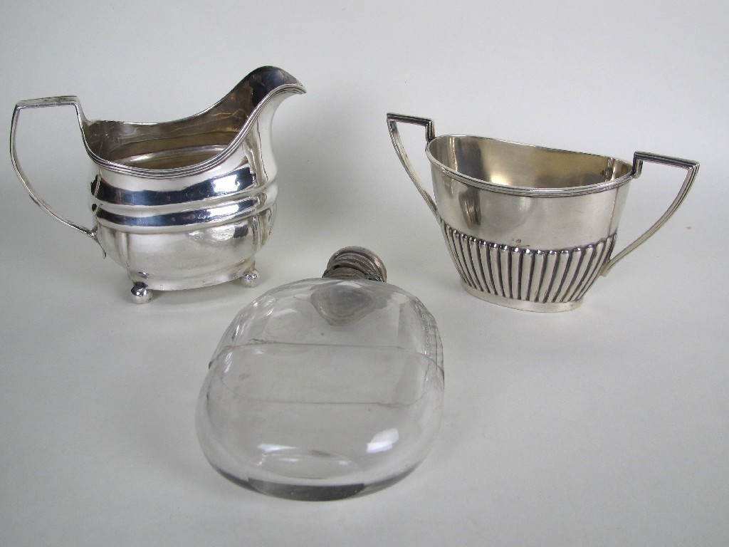 Appraisal: A George III silver cream jug on ball feet London