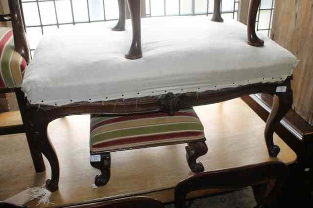 Appraisal: A VICTORIAN WALNUT LARGE DRESSING STOOL with calico cover on