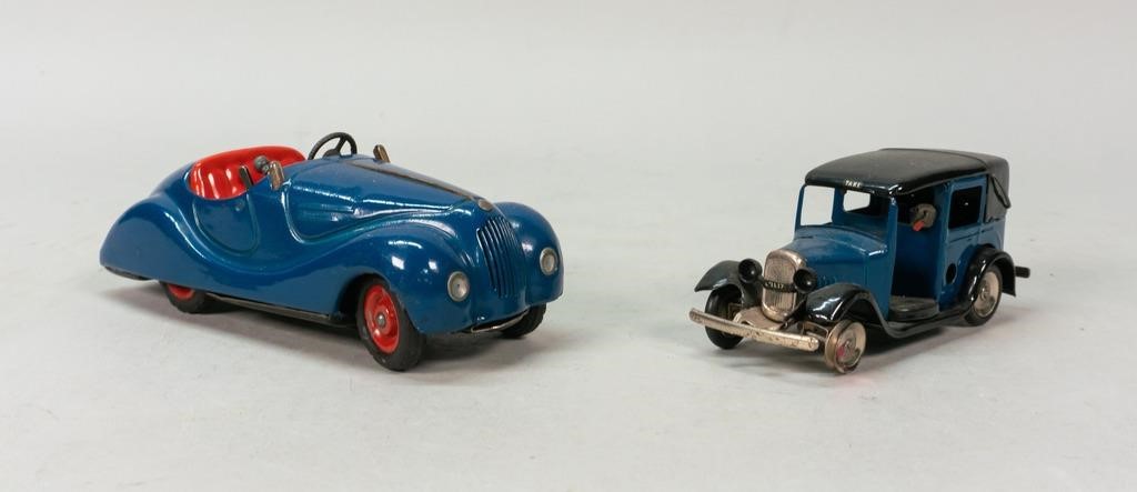 Appraisal: wind-up tin toy cars Shuco Examico wind-up car L Tri-Ang