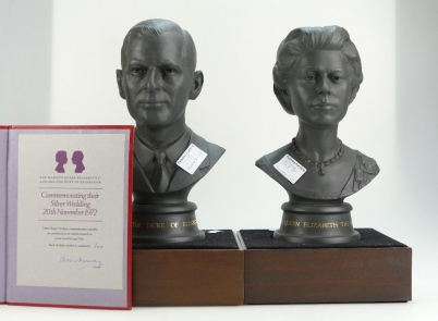 Appraisal: Royal Doulton black basalt pair of commemorative busts of Her