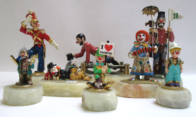 Appraisal: EIGHT RON LEE METAL CLOWN SCULPTURES hand painted and artist