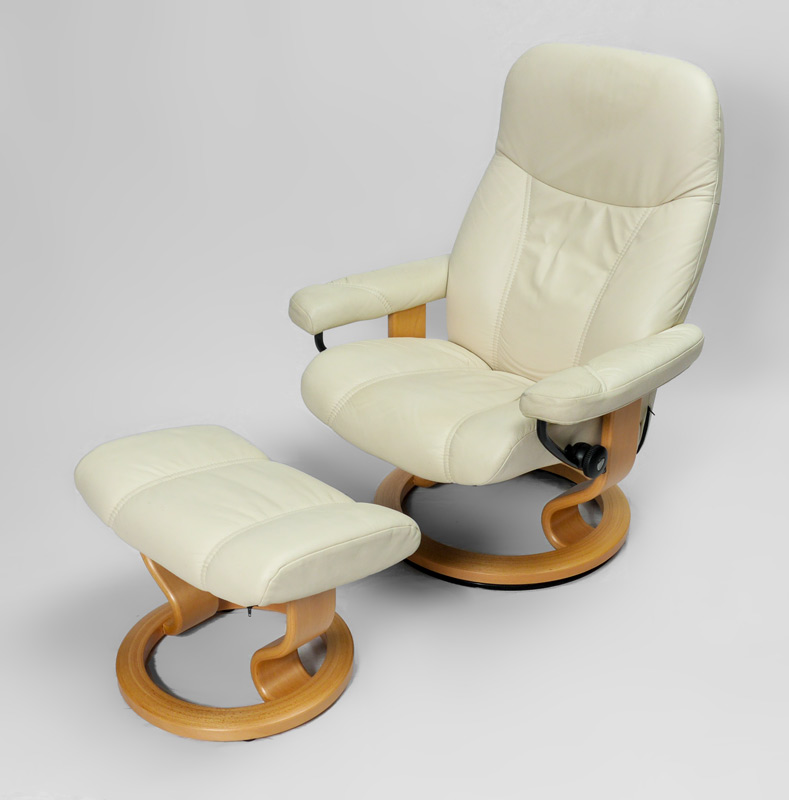 Appraisal: EKORNES STRESSLESS RECLINER OTTOMAN Cream colored leather upholstery '' h