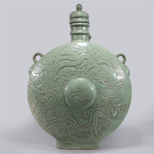 Appraisal: Large and elaborate Chinese celadon glazed covered vase with dragons