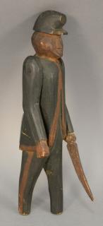 Appraisal: Carved folk art figure of soldier with sword movable arms