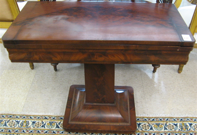 Appraisal: EMPIRE MAHOGANY GAME TABLE American c having a folding rectangular