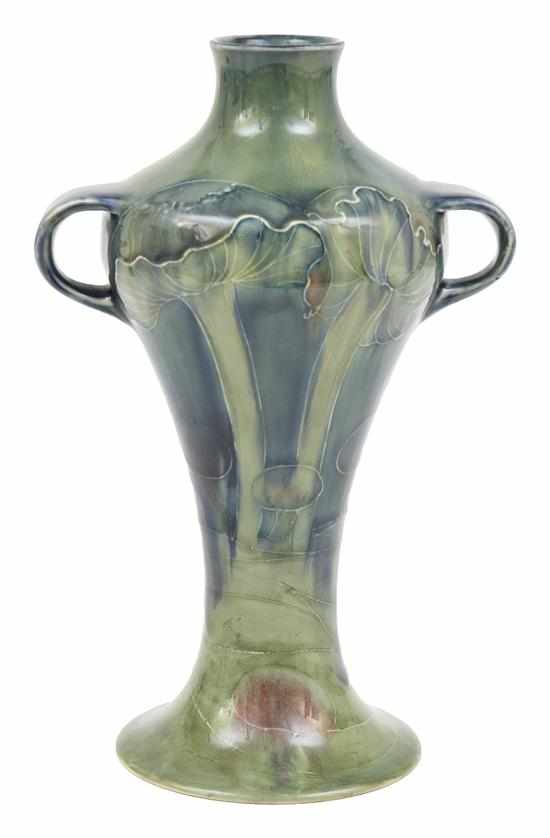 Appraisal: A MOORCROFT TWIN HANDLED CLAREMONT PATTERN VASE CIRCA High shouldered