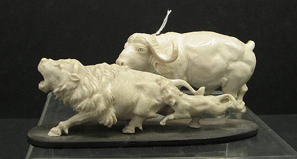 Appraisal: Two African carved ivory animals th century The first lion