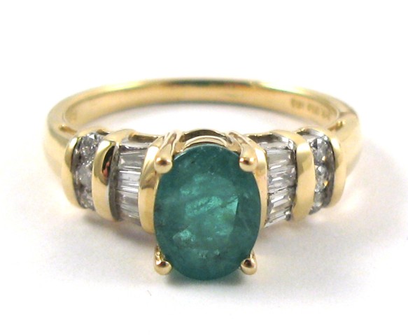 Appraisal: EMERALD DIAMOND AND YELLOW GOLD RING The k yellow gold