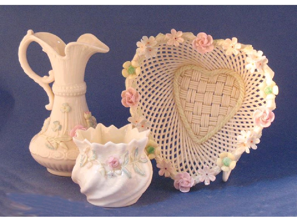 Appraisal: A BELLEEK STRAW-WORK HEART-SHAPED DISH with raised floral decorated border