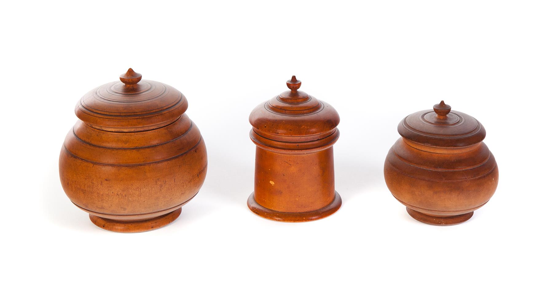 Appraisal: THREE TURNED WOODEN JARS American late th century Two are